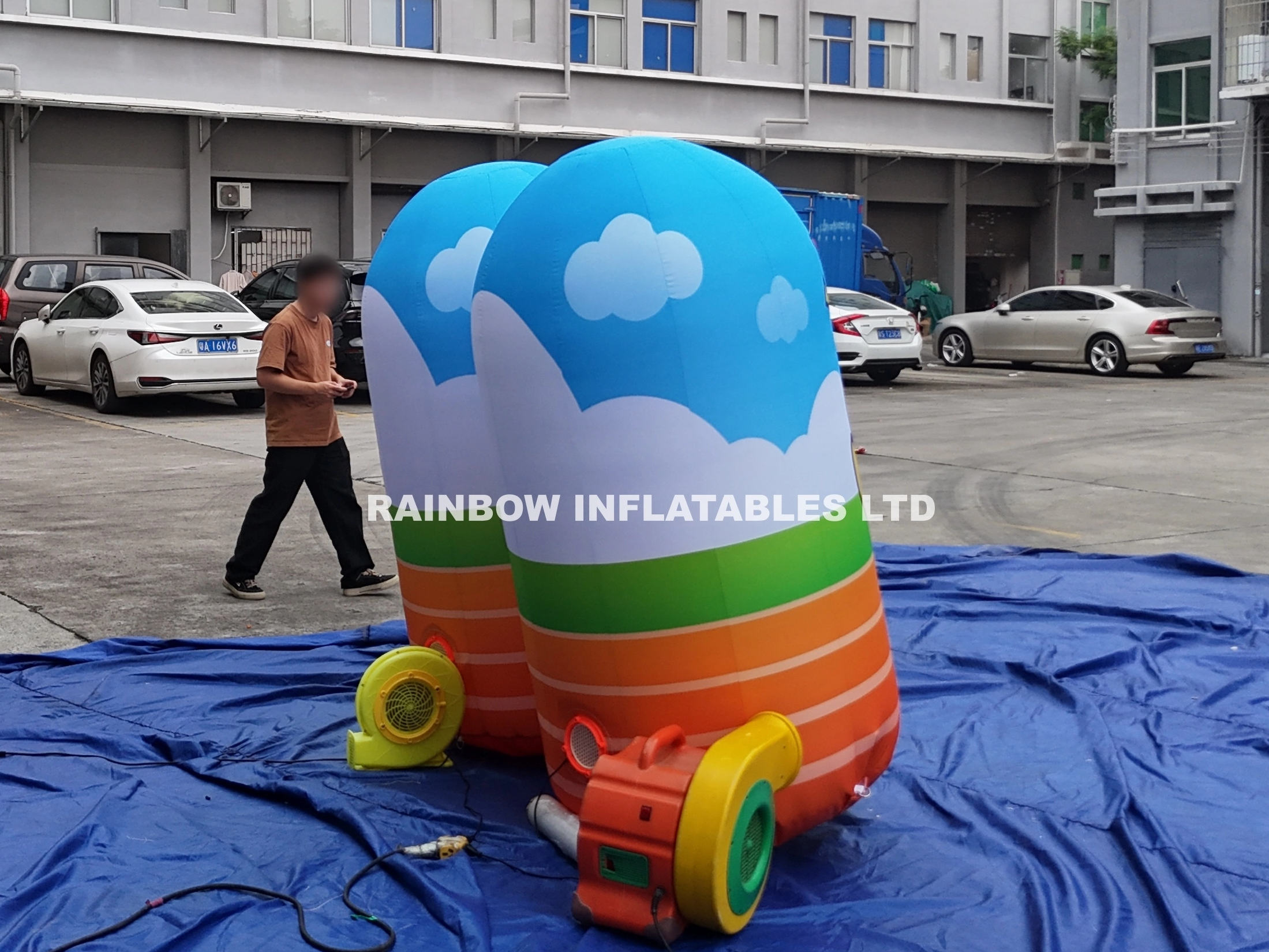 Colorful Inflatable Cartoon Pillars for Race Day Excitement
